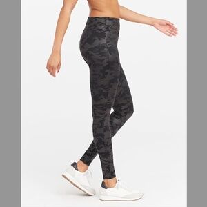 Barley worn Spanx faux leather matte black camo leggings, style 20185R, medium